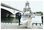 Picture of a bride and groom in front of the Eiffel Tower. 